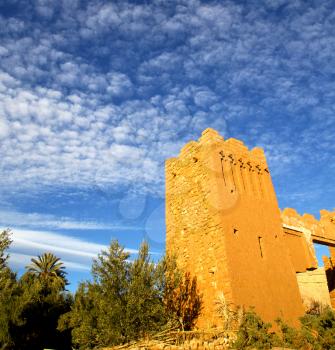 africa  in histoycal maroc  old construction  and the blue cloudy  sky