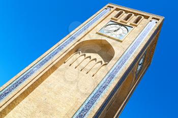 in iran old yazd city and  the antique brick    clock  tower near the sky