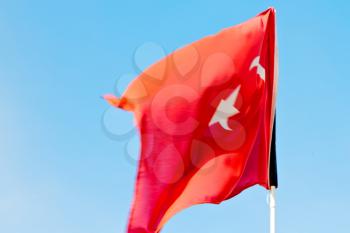 waving flag in the blue sky  morocco    colour and wave