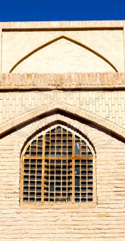 blur in iran old  window  near the mosque and antique construction