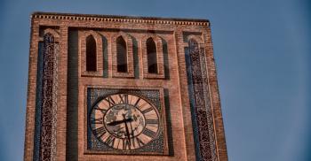 in iran old yazd city and  the antique brick    clock  tower near the sky