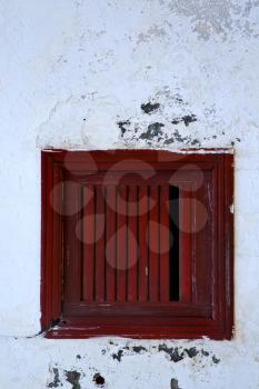 spain brown wood   window in a white wall arrecife lanzarote 
 