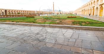 blur in iran   the old square of isfahan prople garden tree heritage tourism and mosque
