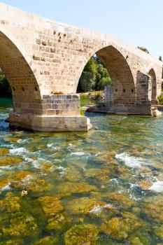 in europe turkey aspendos the old bridge  near the river and nature