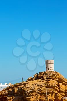 fort battlesment sky and   star brick in oman muscat the old defensive  sea mountain
