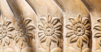 in old iran mousque the column  incision of a flower like abstract background