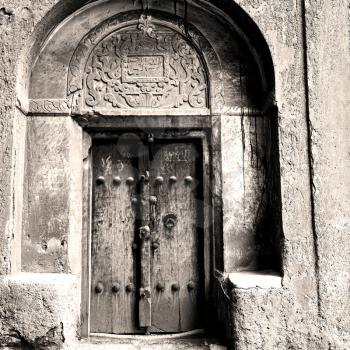 blur in iran old door near the mosque and antique construction