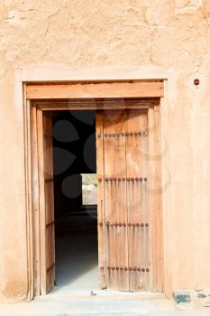   oman old wooden  door and wall in the house