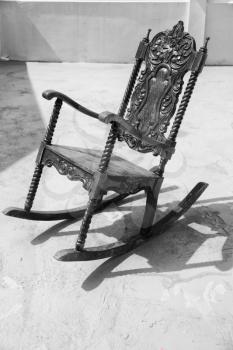 in  philippines old dirty terrace whith rocking chair empty 
