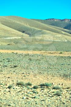 in   valley  morocco      africa the atlas dry  mountain   ground isolated hill 