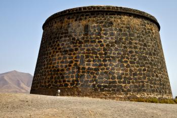 hill lanzarote  spain the old wall castle  tower and door  in teguise arrecife
