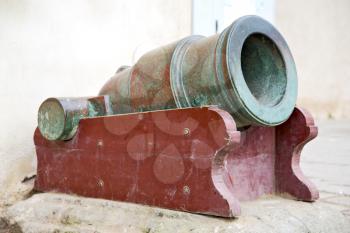 in africa morocco  green bronze cannon and the blue sky
