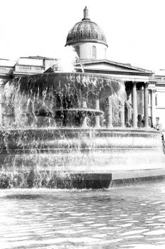 in london england trafalgar square and the old water  fountain 
