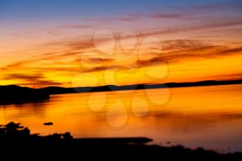 blurred in morocco africa the   sunlight of sunset   a lake near  desert