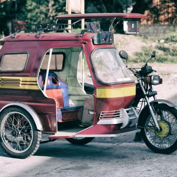 in asia philipphines the typical tuk tuk motorbike for tourist
