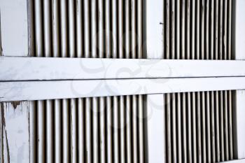 window  varese palaces italy   abstract  sunny day    wood venetian blind in the concrete  brick besnate 

