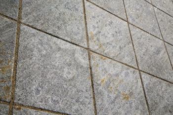 brick  the in cadrezzate   street lombardy italy  varese abstract   pavement of a curch and marble
