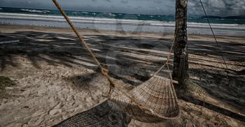 in  philippines  view from an hammock  near ocean beach and sky concept of relax
