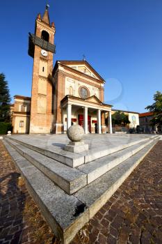 in  the parabiago old   church  closed brick tower sidewalk italy  lombardy  