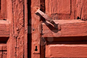 spain knocker lanzarote abstract door wood in the red brown 
