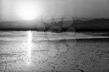in  danakil ethiopia africa  in the  salt lake  the sunset  reflex  and landscape