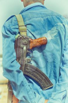 in  danakil ethiopia africa   the rifle and the back of the guard concept  of safety and protection
