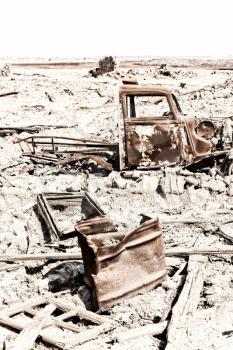 in  danakil ethiopia africa  in the   old abandoned  italian village   colony rusty antique car and hot concept of horror apocalypse 