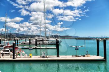 in  australia Airlie Beach and the boat in the pier near ocean