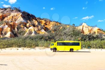 in  australia fraser island and the sand track of the bus near the ocean and sky