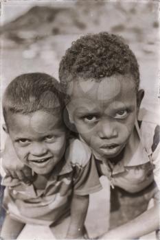 ETHIOPIA,DANAKIL-CIRCA  JANUARY 2018--unidentified   little kids near the  desert 
