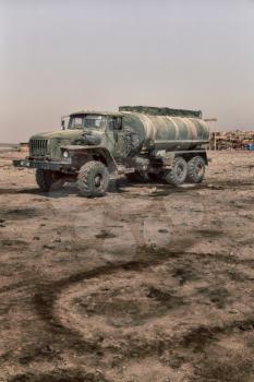   ETHIOPIA,DANAKIL-CIRCA  JANUARY 2018--unidentified  military truck for the water parked in the dirty