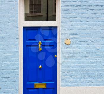 notting hill in london england olod suburban and antique wall door 