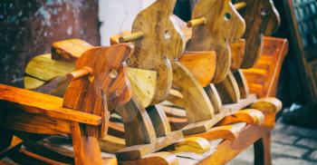 in a old market rocking horse made in wood like abstract concept