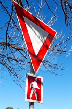 crosswalk sign  simbol isolated  in the sky warning concept