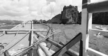 blur  in  philippines   view of the island hill from the prow of a boat