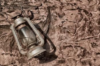 in the rock desert of jordan an antique old fashioned lamp isolated
