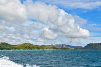 blur  in  philippines   a view from  boat  and the pacific ocean  mountain background