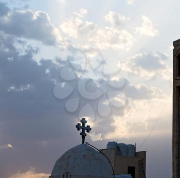 in amman jordan the chatolic church in the light of cloudy sunset
