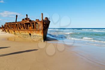 in australia fraser island the antique rusty and damagede boat and  corrosion in the ocean sea