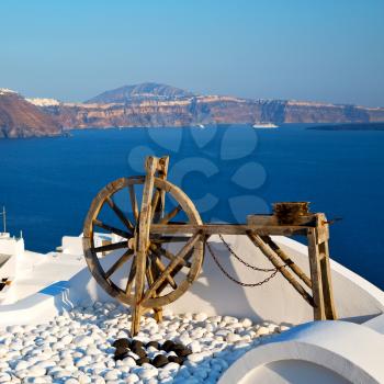 greece in santorini the old town near      mediterranean sea and  spinning wheel