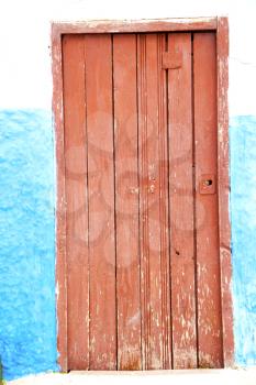 historical in     antique building door morocco      style africa   wood and metal rusty
