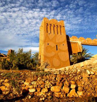africa  in histoycal maroc  old construction  and the blue cloudy  sky