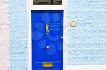 notting hill in london england old suburban and antique    wall door 