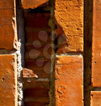 old wall  brick in the   centre   of cairate varese italy