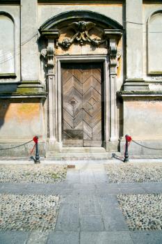  italy church santo antonino  varese  the old door entrance and mosaic sunny daY