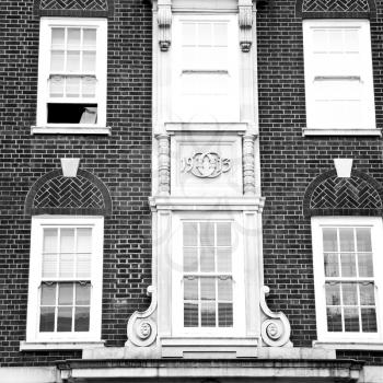 in europe london old red brick wall and            historical window