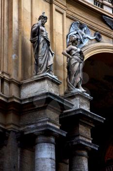 grey marble statue of divinity  in the monument galleria vittorio emanuele naples italy