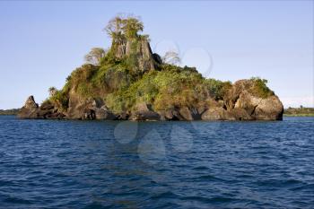 isle river   palm  rock stone branch hill lagoon and coastline in madagascar nosy be nosy faly
