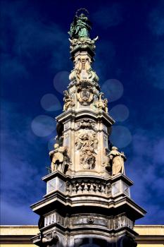 marble statue of obelisk immacolata  in the centre of naples italy church 