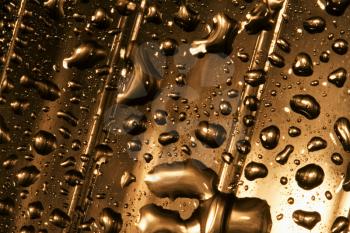 abstract gold drop in a plastic material